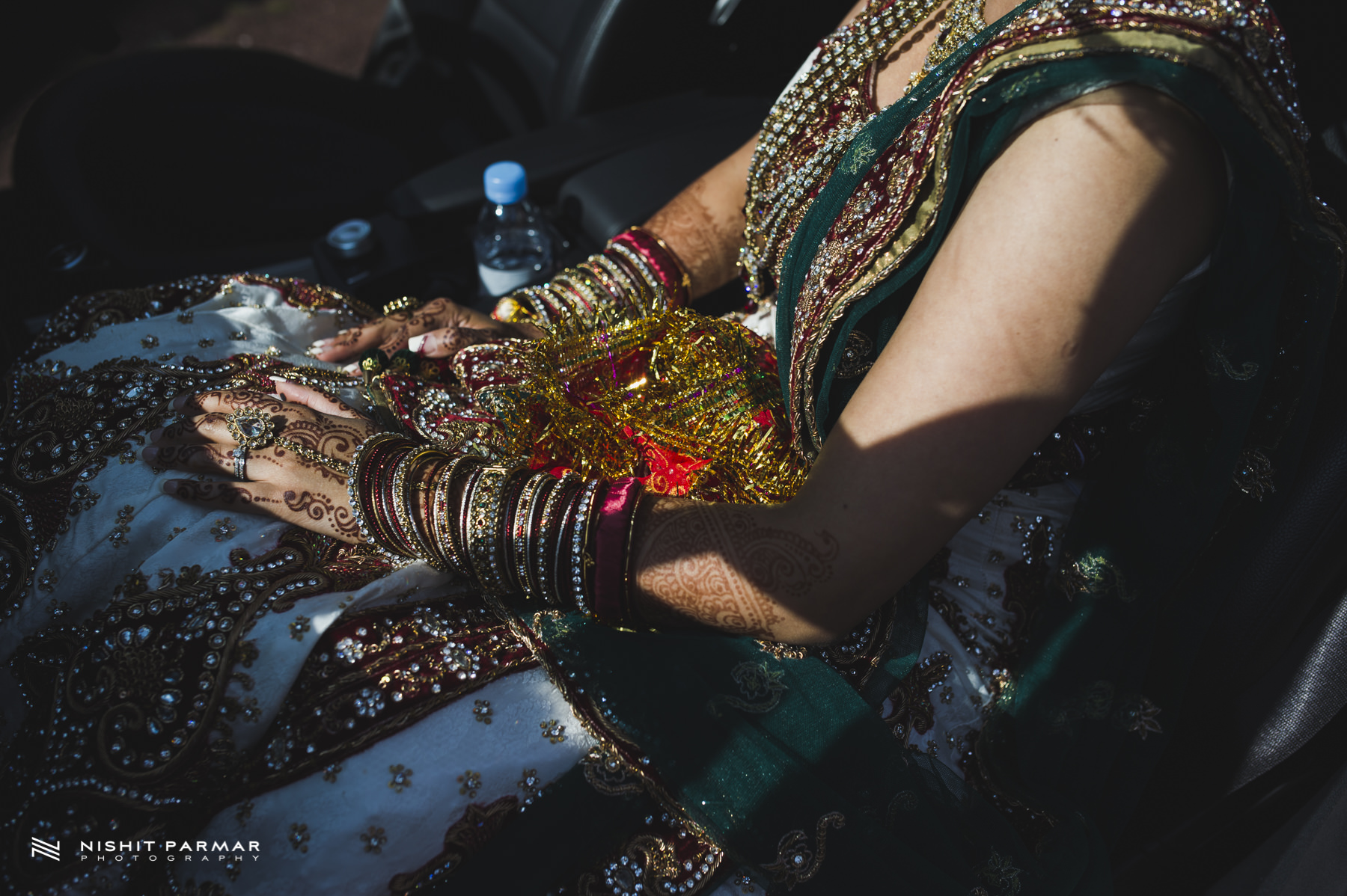 Asian Bride waiting in the Wedding Car