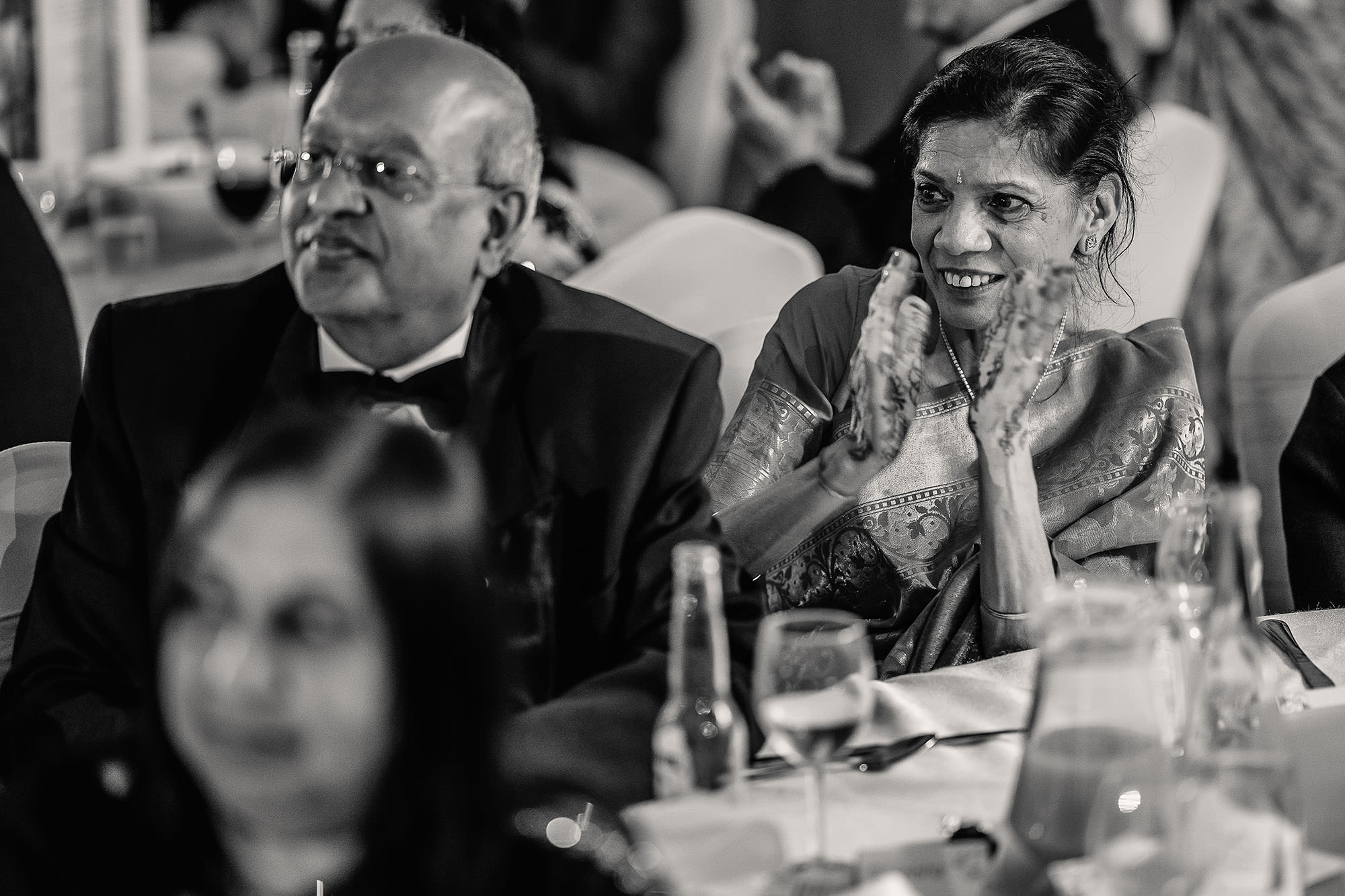 brides parents laughing at speeches