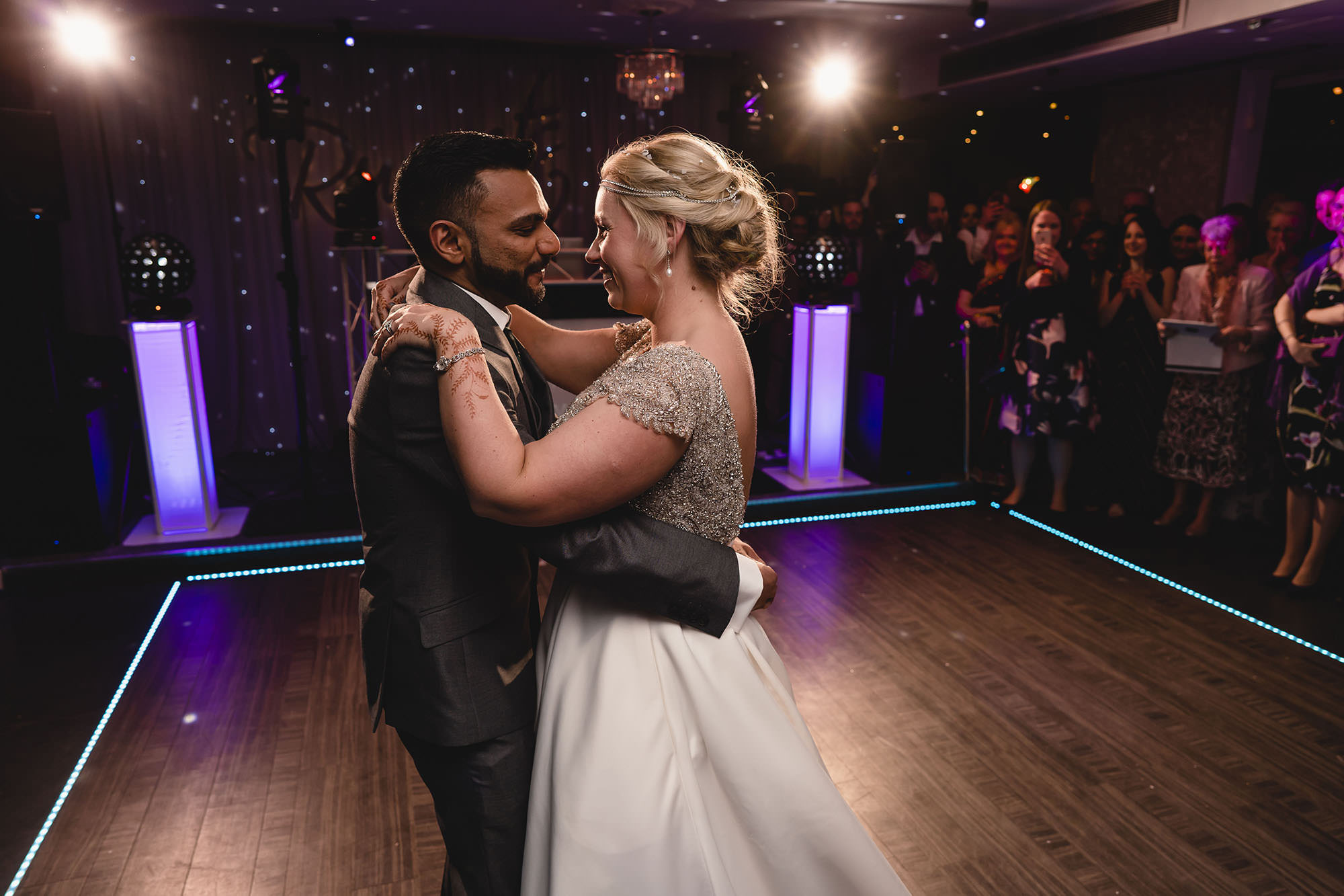 bride and grooms first dance at their reception