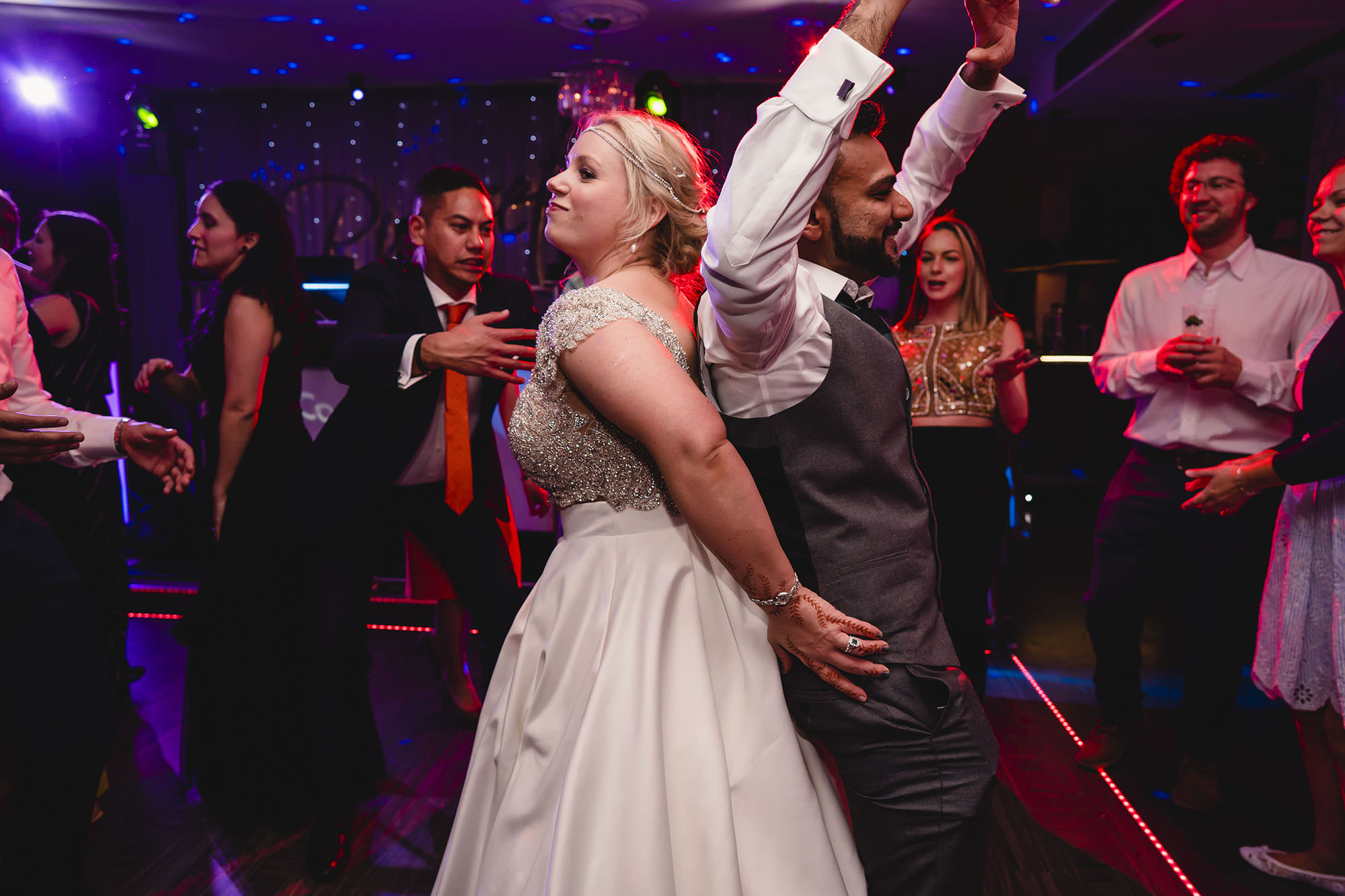 bride and groom partying on the dancefloor